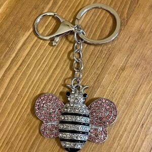 Bee bag tag/key chain with pink, clear rhinestones on a silver tone chain 4 1/2”